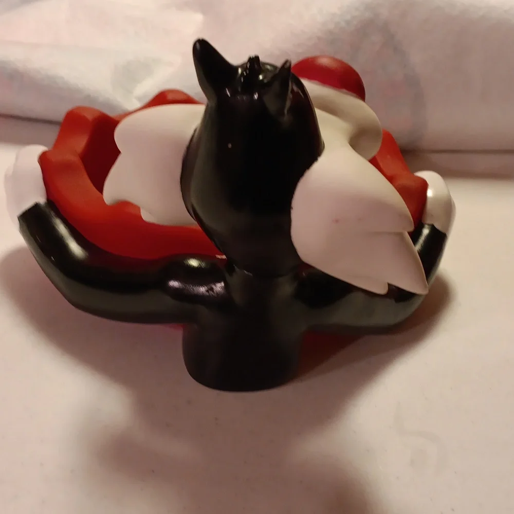 Looney Tunes Sylvester cat bowl holder.